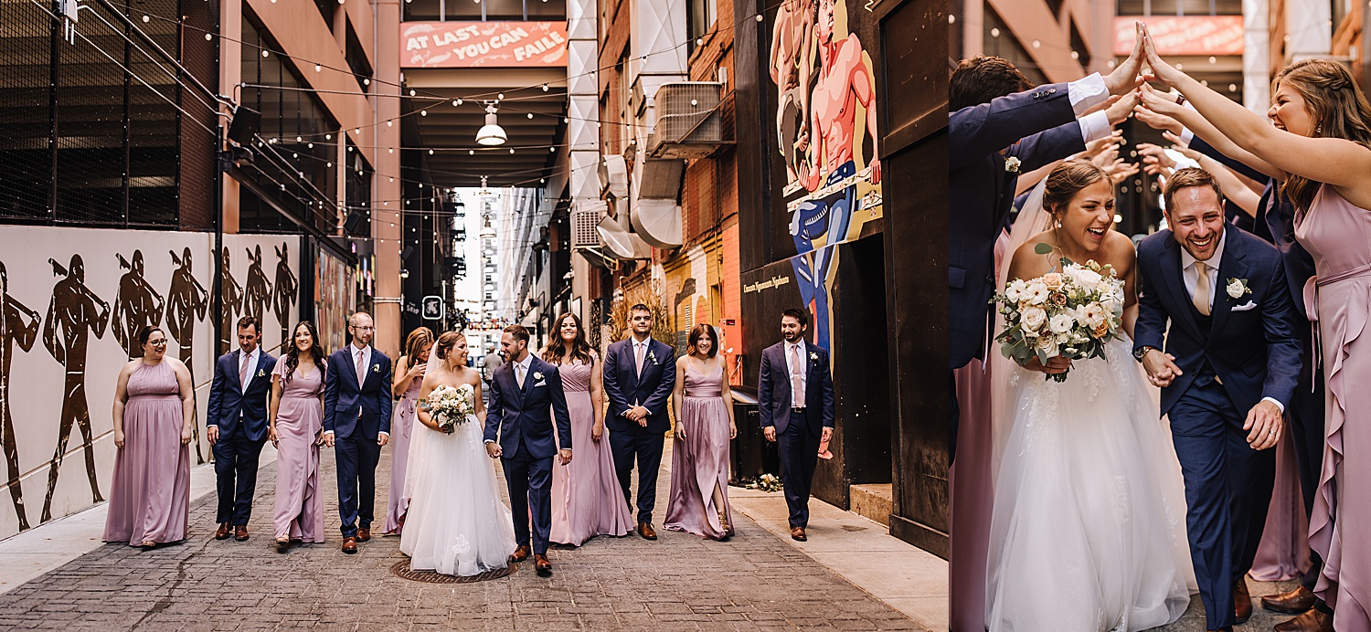newly married couple walking with wedding party and Detroit wedding photographer 