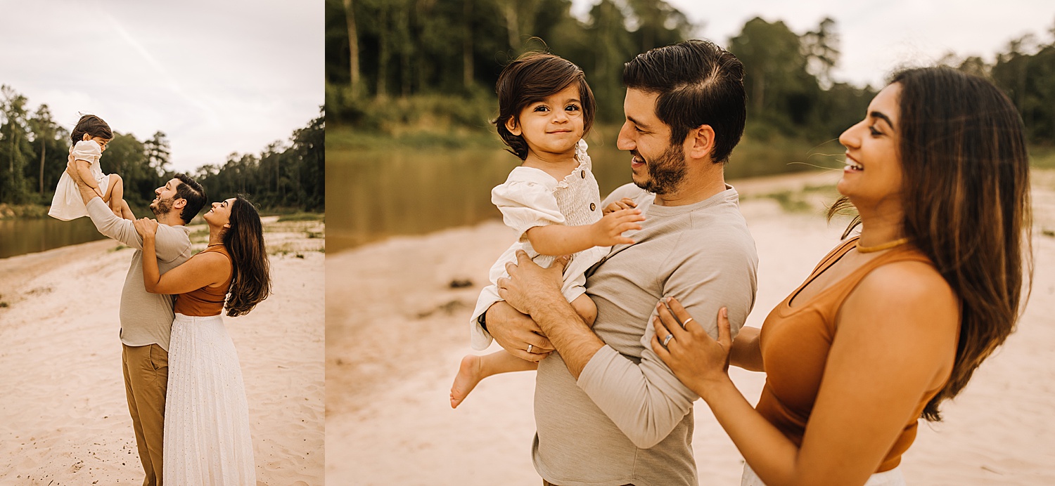 Mom and dad throw daughter in air during boho beach session with documentary family photographer